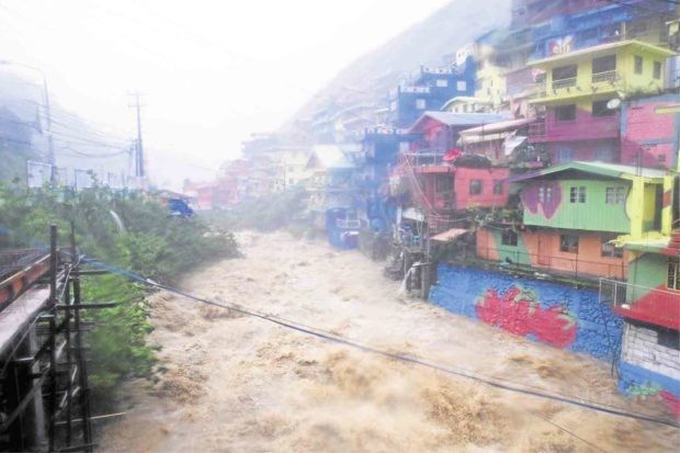 This is not a river. It is the main road of La Trinidad, one town north of Baguio.