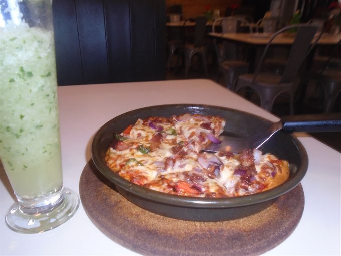 A pan pizza before shopping.