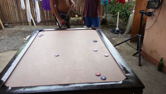 A Philippine street pool table. (arnel insecto)